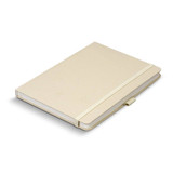 A beige hard cover notebook with a textured finish and an elastic closure. The notebook contains blank pages.