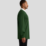 A green rugby jersey with a white collar, featuring long sleeves and a fitted design, displayed from the side.