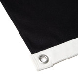 A black canvas flag featuring a white hem and grommet for secure hanging.