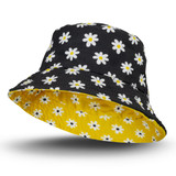 A reversible bucket hat featuring a black floral pattern with daisies and a yellow inner lining. Includes a logo.