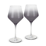 Two elegant wine glasses with a gradient from clear to dark grey. Each features a slender stem and round base.