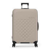 A taupe 29" Rollink Flex 360 Spinner Suitcase with a patterned surface and a retractable handle.