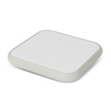 A square, lightweight wireless charger in white and pale green, featuring a simple design and a logo.