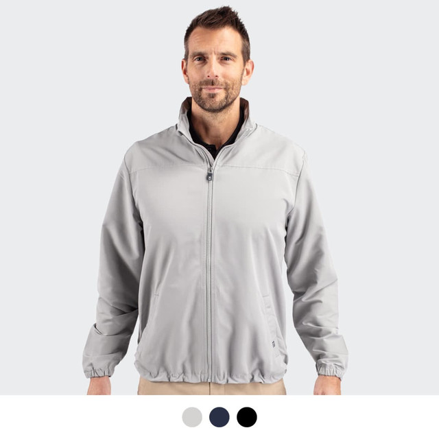A man wearing a light grey full zip jacket with a collar, featuring an elasticated hem and cuffs.