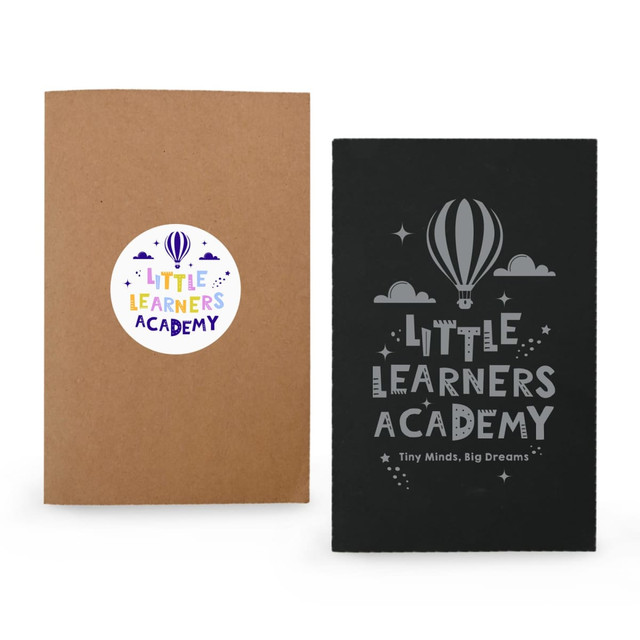 A pair of notebooks featuring a kraft cover and a black cover with a balloon design, both with branding.