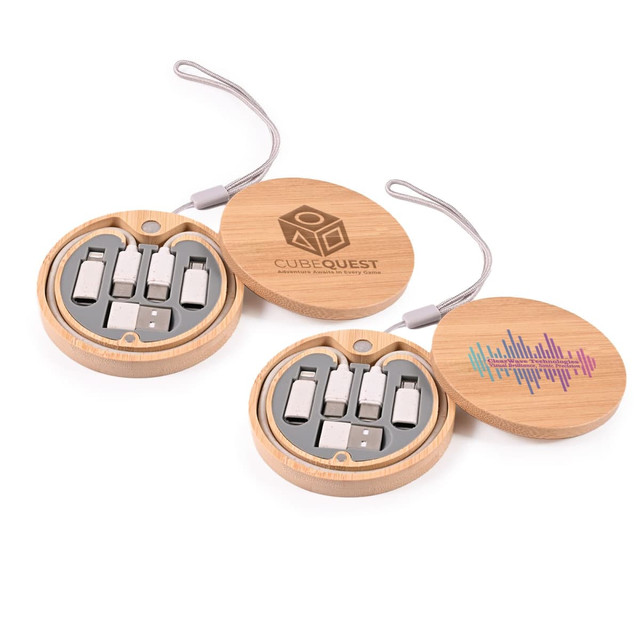 A circular bamboo case containing various charging cables in silver and grey, featuring a logo on the lid.