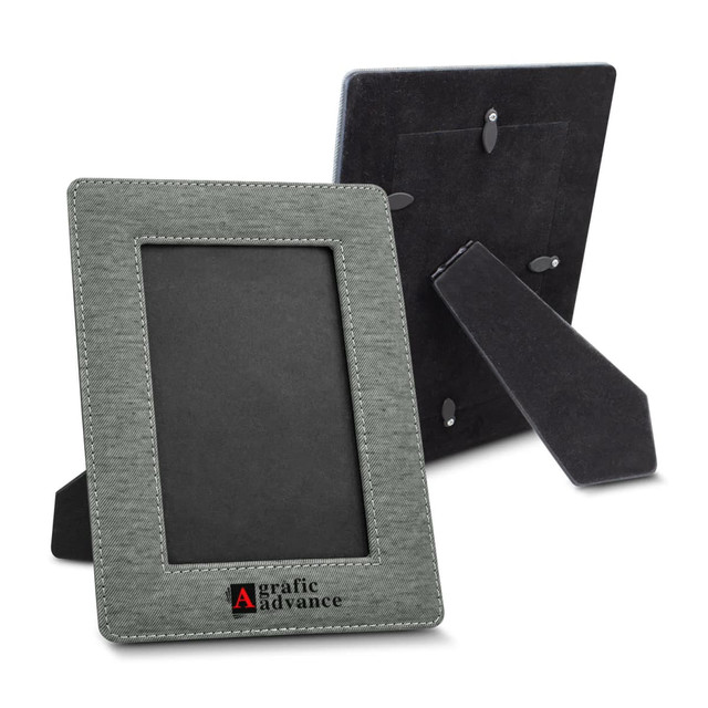 A grey photo frame featuring a textured finish and a stand at the back. Includes a logo on the front.