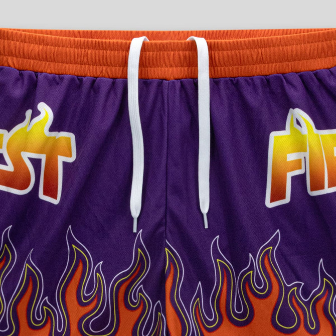 Custom women's active shorts in purple with orange accents, featuring a flame design and a drawstring waistband.