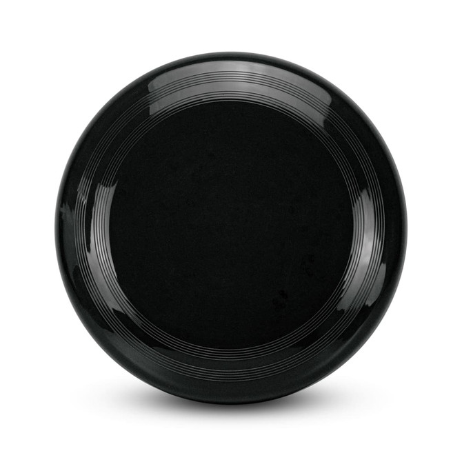 A frisbee in solid black with a smooth surface and circular design, featuring subtle textured rings around the edge.