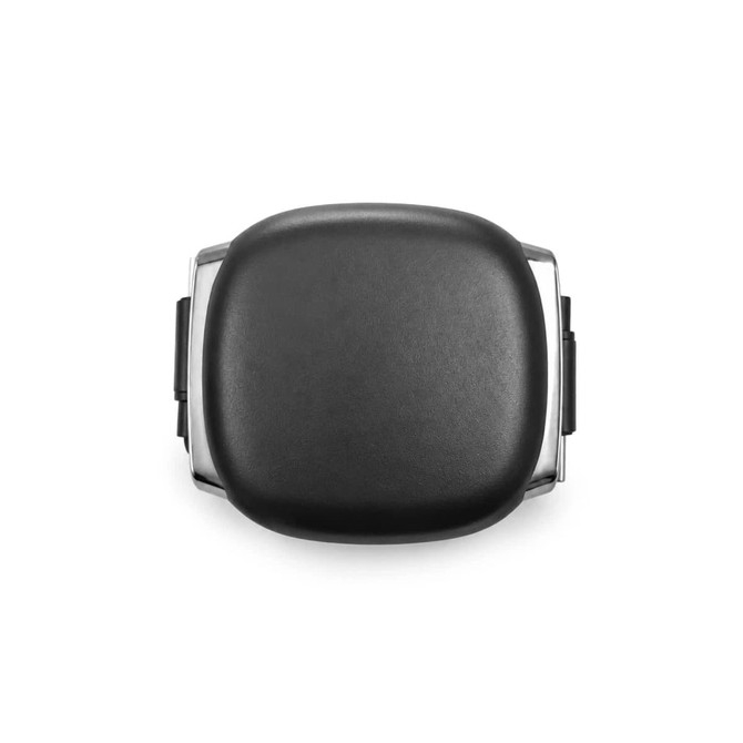 A black rectangular product with a smooth surface and metallic accents, featuring a logo on the front.