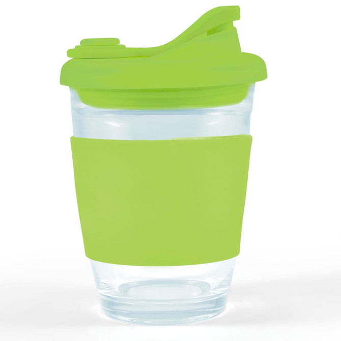 A reusable coffee cup with a clear body and a vibrant green silicone sleeve and snap lid.