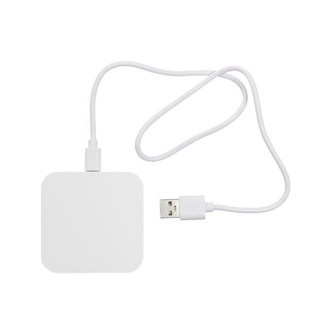 A wireless charger with a square design, featuring a white surface and a USB connection cable.