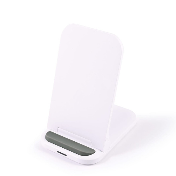 A white wireless charger with a sleek, angled design and a green accent at the base.
