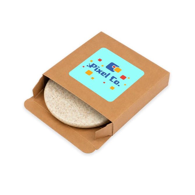 A round, natural-coloured wireless charger is presented in a brown cardboard package with a logo on the front.