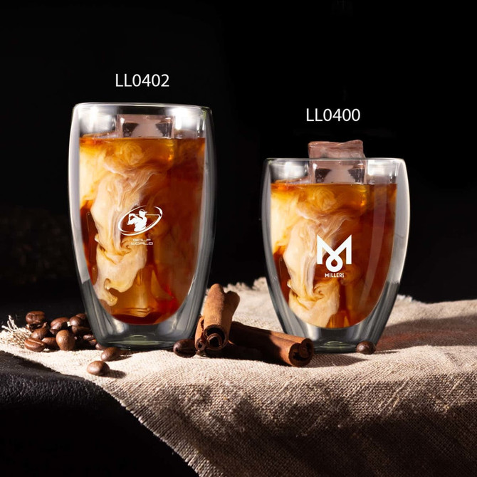 A drink bottle featuring two double wall glass cups in clear glass, showcasing coffee with cream and decorative elements.