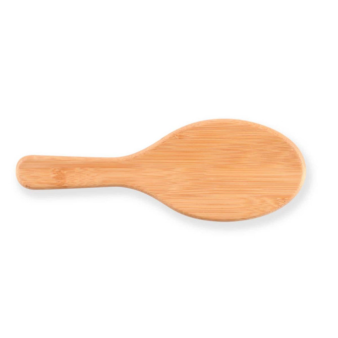 A bamboo hair brush with a smooth, rounded design suitable for health and personal grooming.