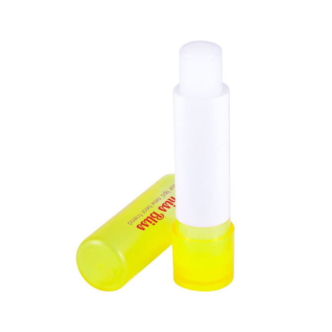 A lip balm stick in a vibrant yellow tube, featuring a white cap and clear body for easy viewing of the product inside.
