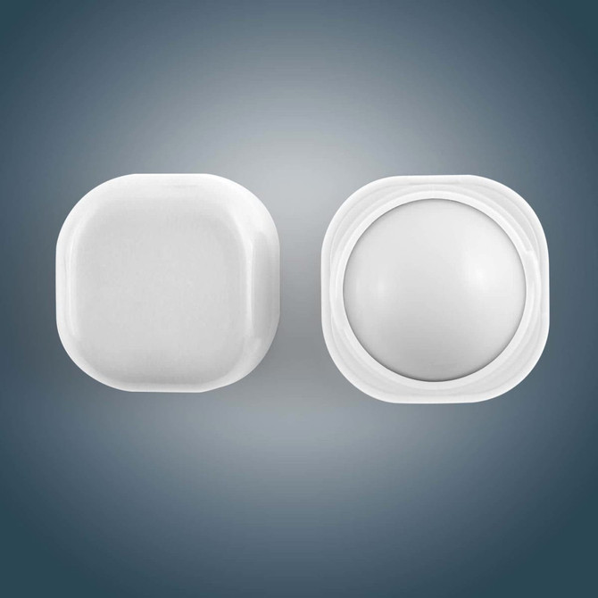 A Cube Lip Balm features a compact, square container with a rounded lip balm interior, both in a clean white design.
