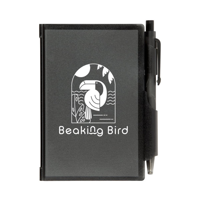 A black Odyssey Pocket Notebook featuring a design with "Beaking Bird" and accompanied by a pen attached to the cover.