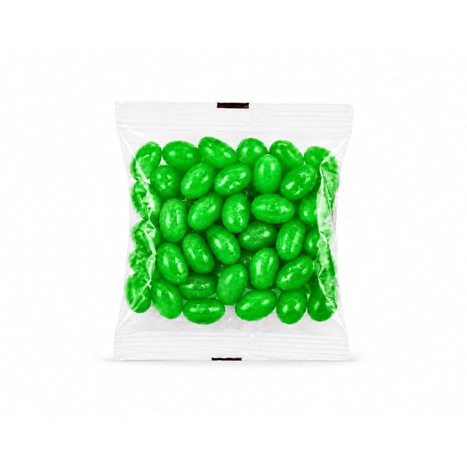 A clear cello bag containing vibrant green jelly beans.