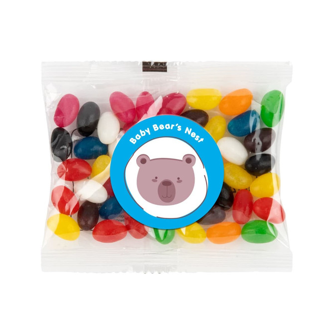 A cello bag filled with assorted color mini jelly beans, including red, yellow, green, black, and white candies.