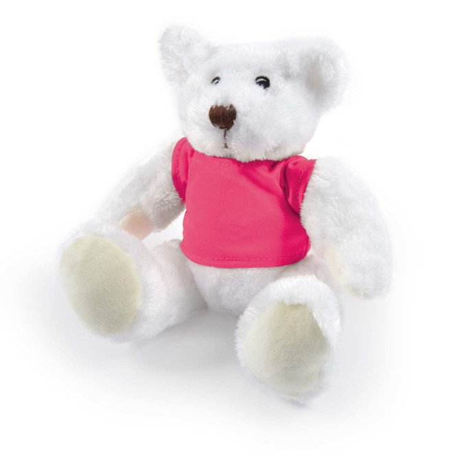 A white plush teddy bear wearing a pink shirt, sitting with its legs outstretched. The bear has round ears and a brown nose.