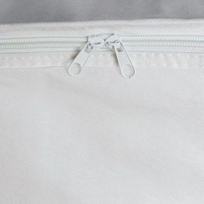 A white cooler bag with a zippered closure at the top, featuring two zip pulls and a simple design.