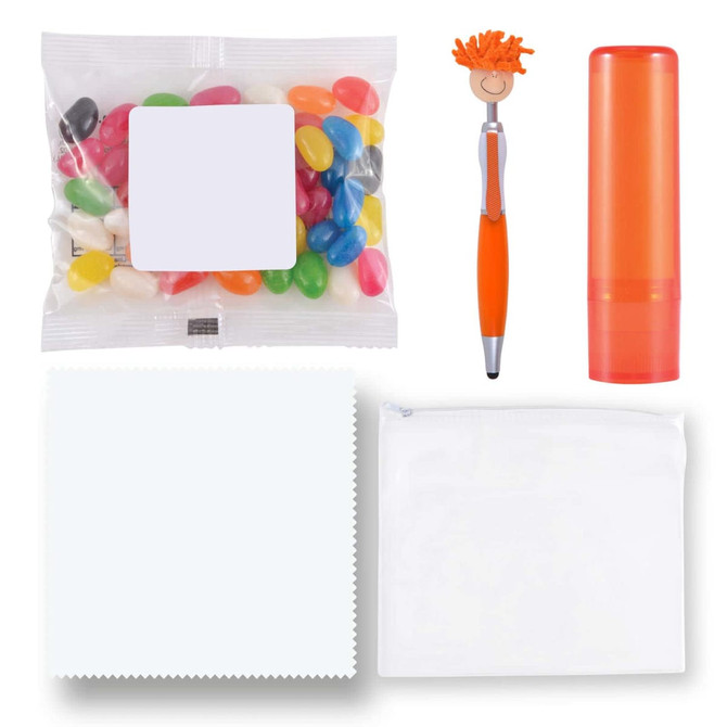 A collection of colorful jelly beans, an orange pen, a bright orange lip balm tube, and white pouches.