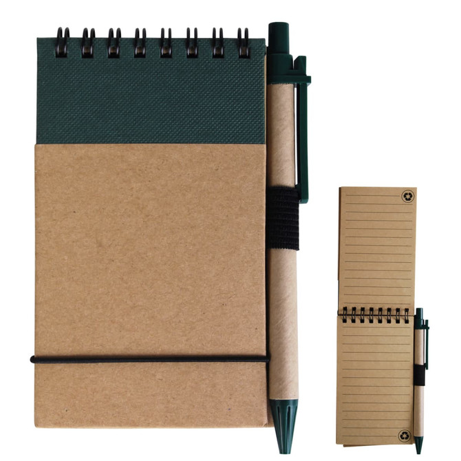 A cardboard notebook with a green cover and a pen attached. The notebook features a coil binding and lined pages.