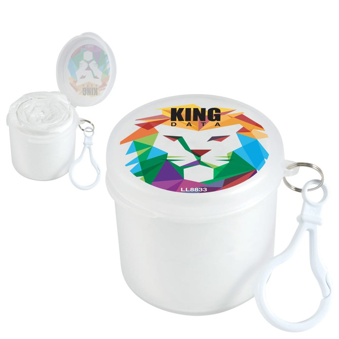 A colorful container with a lion graphic, holding a rolled-up poncho and featuring a keyring attachment.