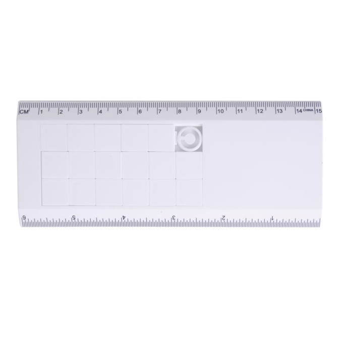 Amaze Tile Ruler Puzzle in white with a grid pattern and measurement markings along one edge. Features a circular cutout.