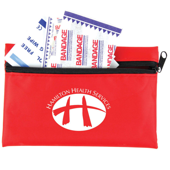 A red first aid kit containing bandages, with a zipper closure and a logo on the front.