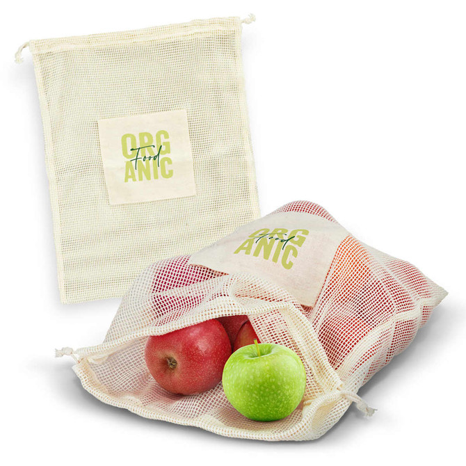 A cotton produce bag filled with red and green apples, featuring a logo that reads "Organic."