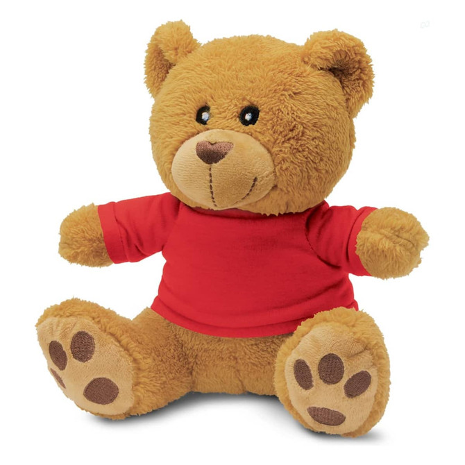 A plush teddy bear in light brown with a red shirt, featuring soft fur and round ears. It has a branding logo.