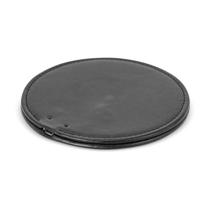 A round, black wireless charger with a smooth surface and a micro USB port.