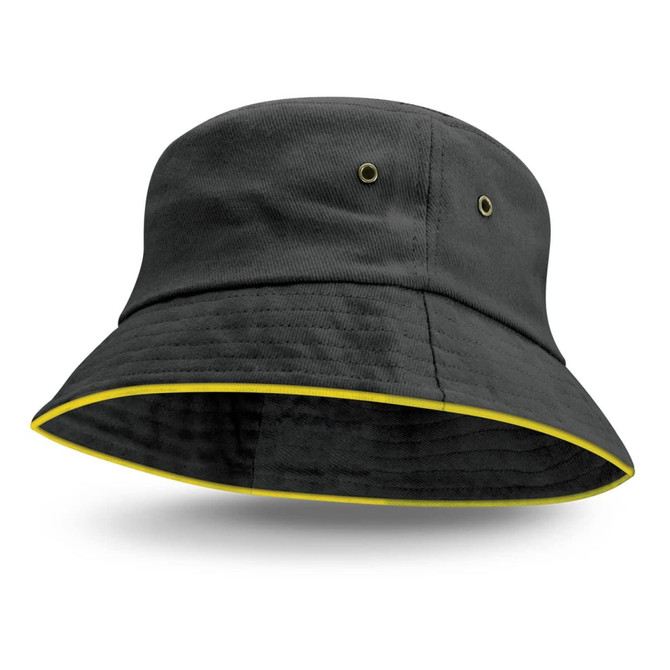 A black bucket hat featuring a coloured yellow sandwich trim and two eyelets on the sides.