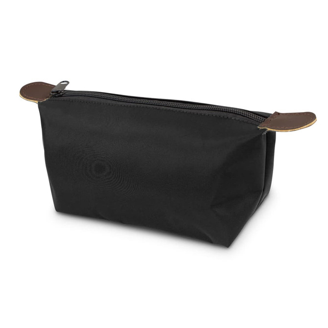 A black toiletry bag with leather accents and a zip closure. It has a rectangular shape and is made of durable material.