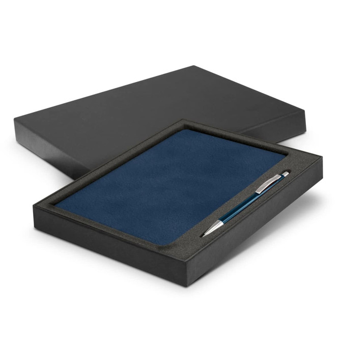 A navy notebook and a silver pen packaged in a black gift box, featuring a smooth surface.