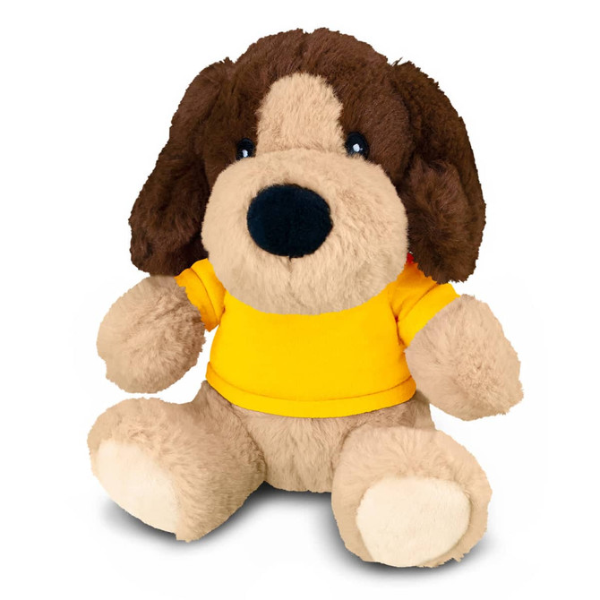 A plush dog toy with a brown and cream body, wearing a yellow shirt, featuring a friendly expression and soft texture.