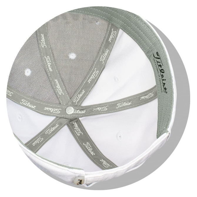 A white cap featuring a grey inner lining and a logo. Designed for golf, ideal for ball marking.