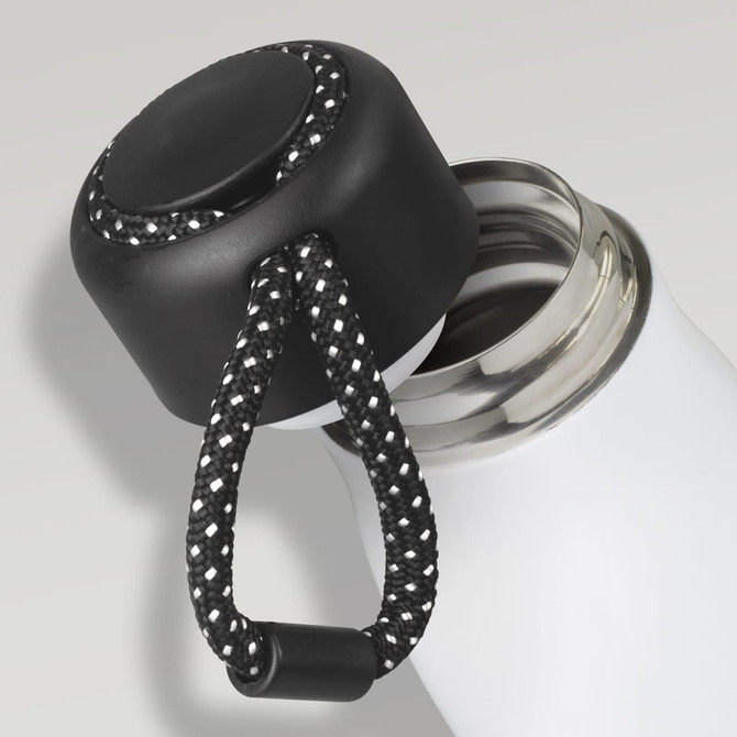 A drink bottle with a sleek white body and a black, textured lid featuring a black and white braided strap.