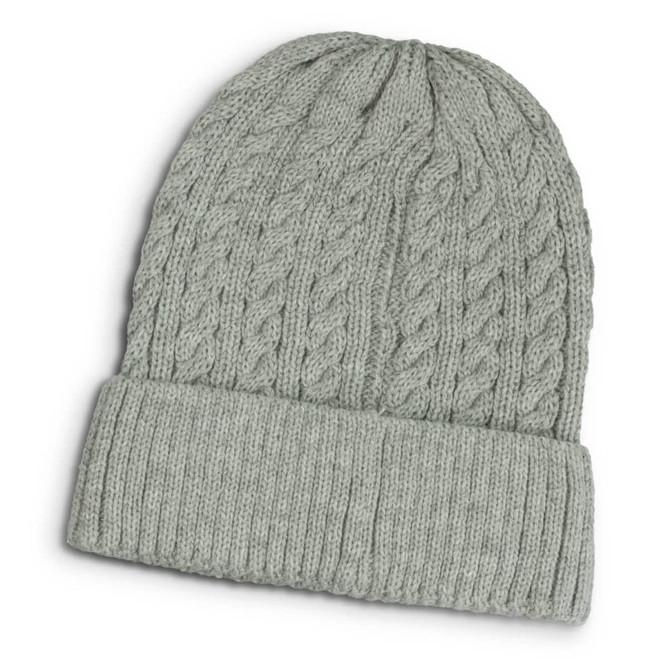 A light grey knitted beanie with a textured cable pattern and a folded cuff. Features a logo on the side.