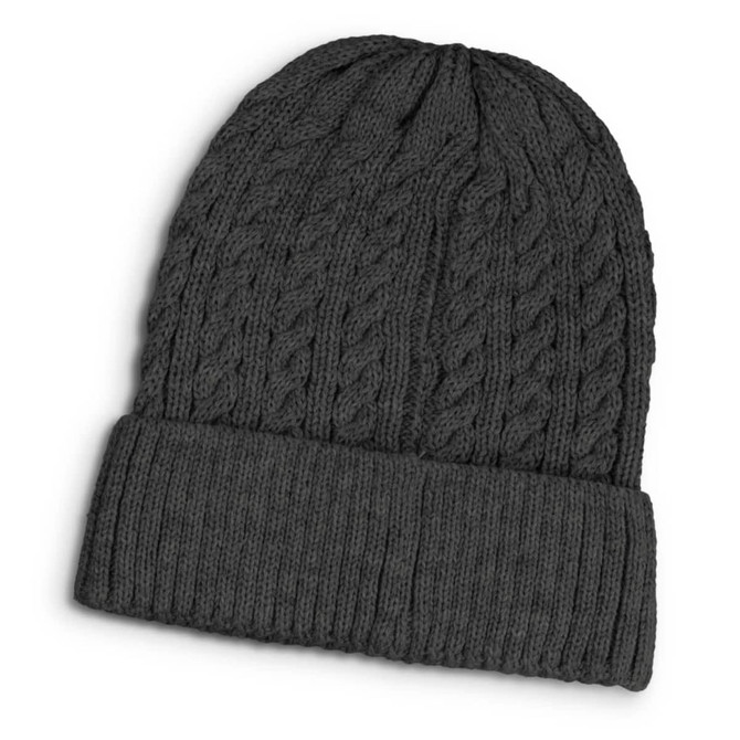 A dark grey cable-knit beanie with a folded brim and an intricate knit pattern. It features a logo.