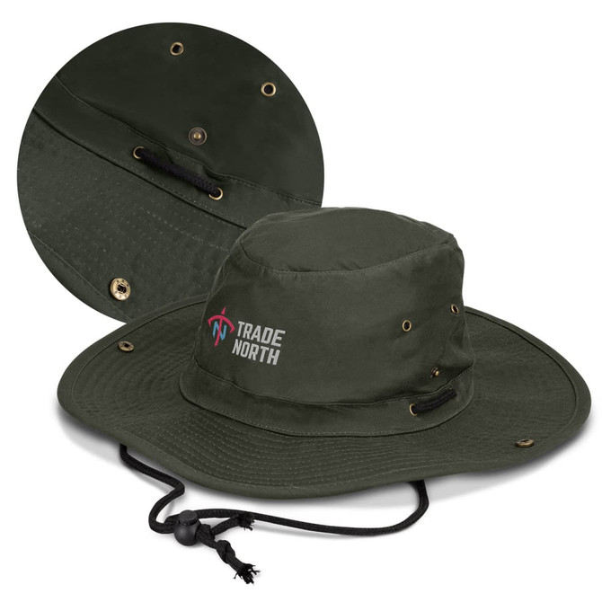 An olive green oilskin wide brim hat with ventilation holes and a chin strap, featuring a logo.