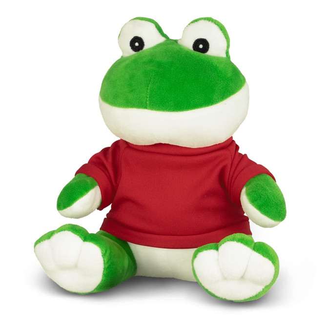 A green frog plush toy with a white belly and red shirt, featuring large eyes and a smiling expression.