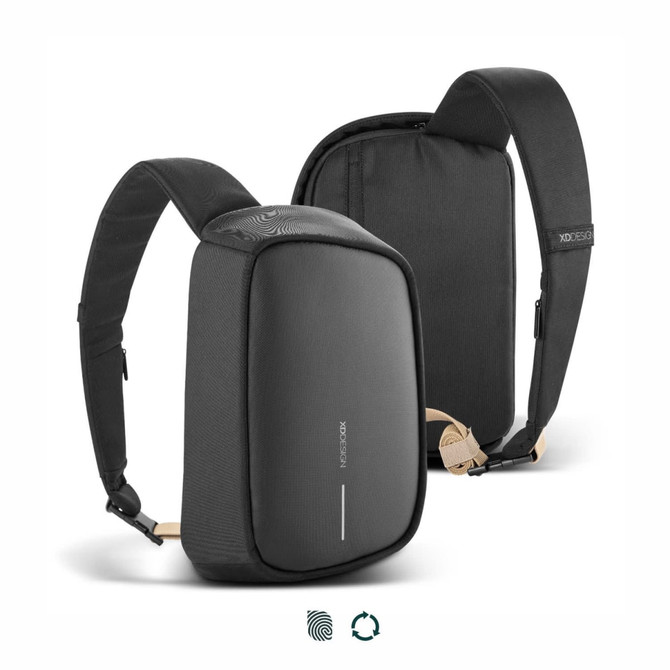 A black sling bag with adjustable straps and a logo, featuring a sleek design and a padded compartment.