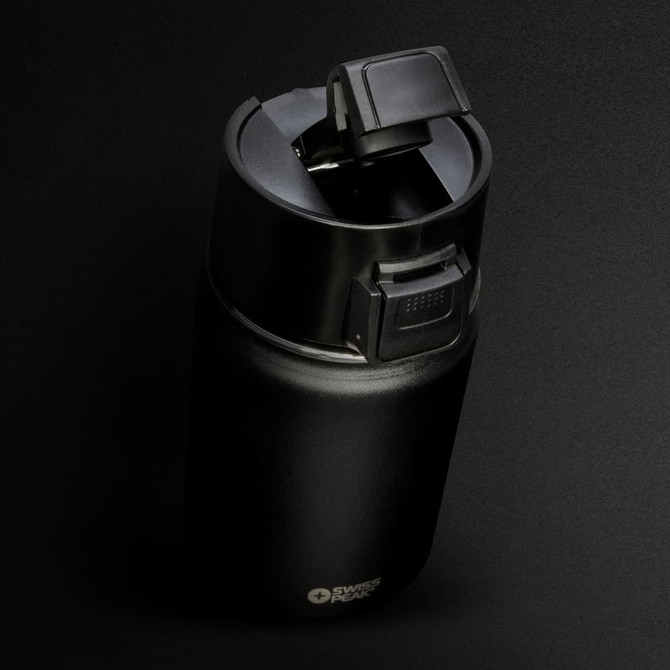 A drink bottle in matte black with a flip-top lid and a logo on the side, set against a dark background.