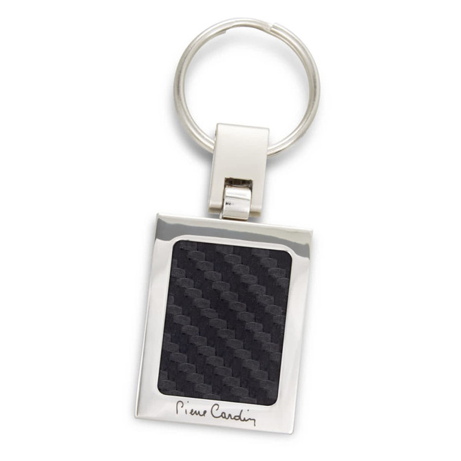 A silver key ring with a rectangular carbon fibre insert and a logo. The key ring features a polished finish.