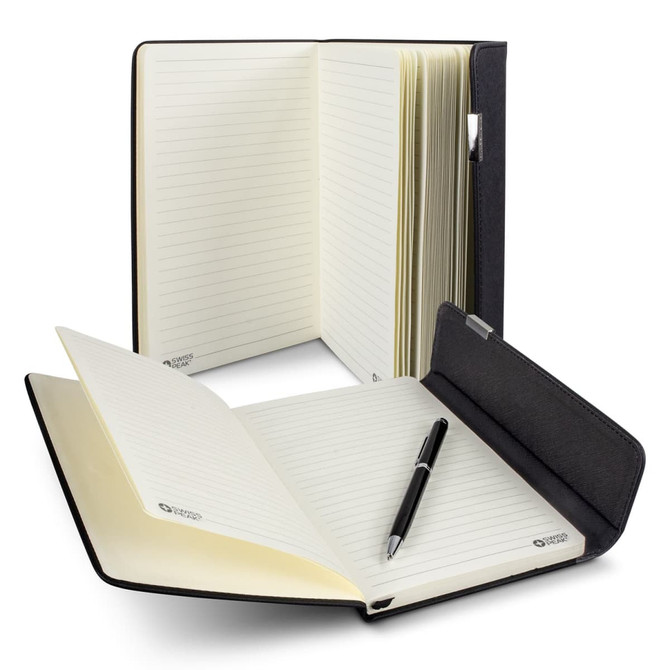 A Swiss Peak A5 notebook in black with lined pages, accompanied by a matching pen, displayed open and closed.