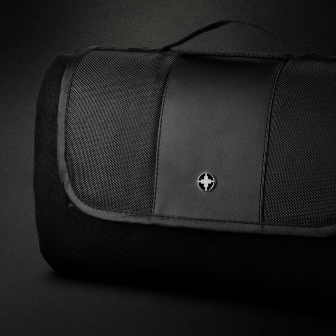 A black picnic blanket with a textured surface and a logo on the top, featuring a foldable design and carrying handle.